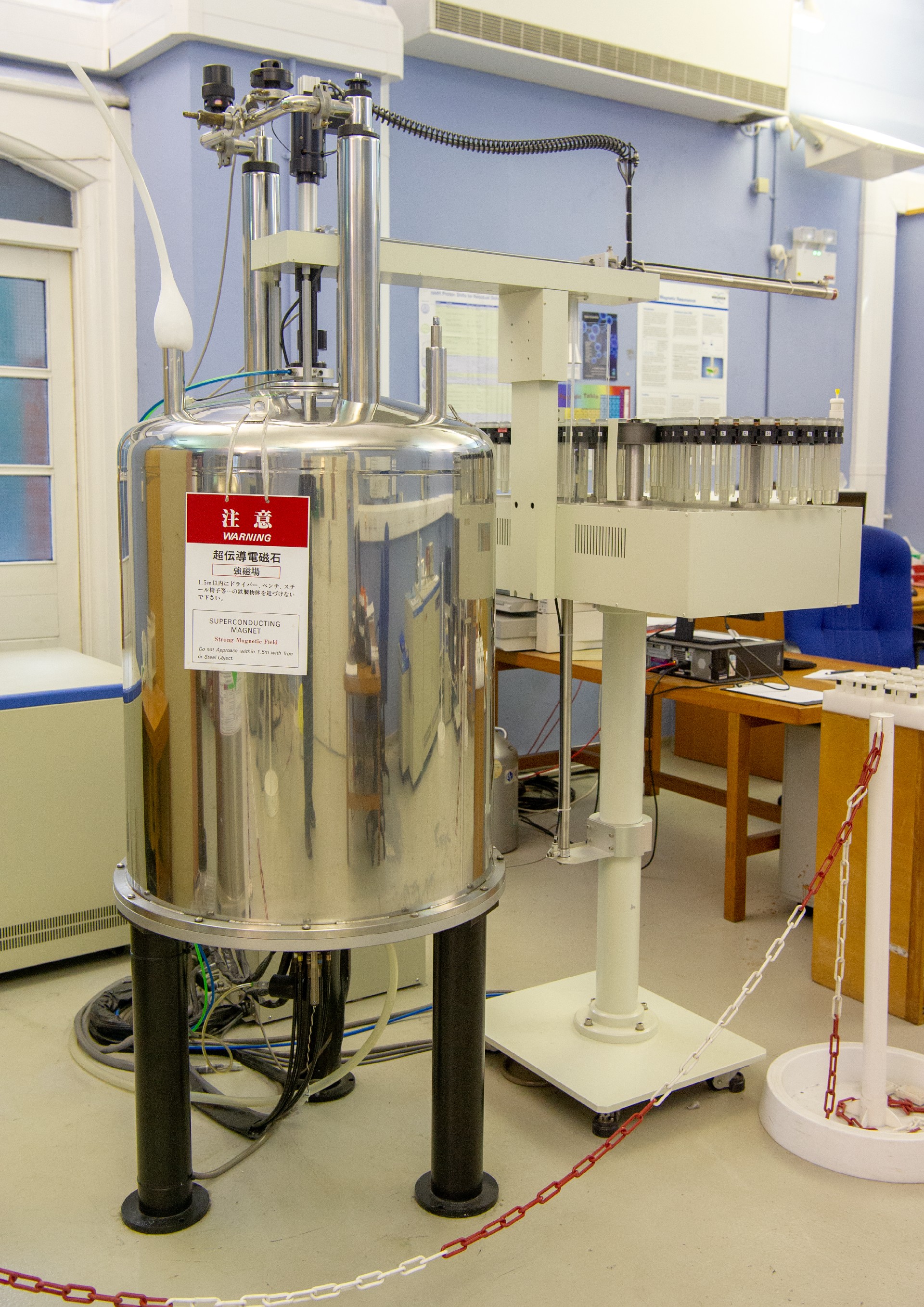 Nuclear Magnetic Resonance (NMR) spectrometer in a laboratory setting